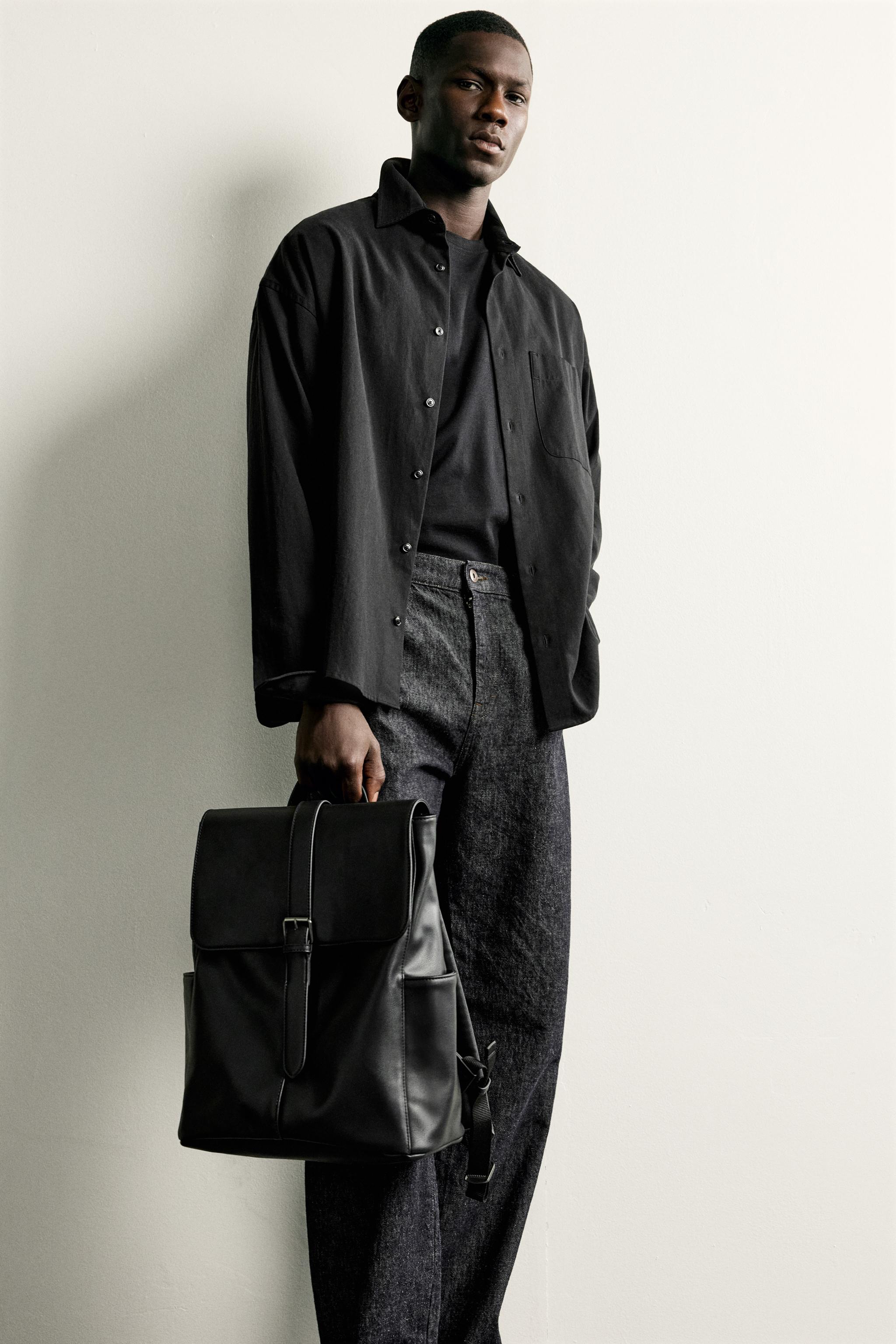 BELTED FLAP BACKPACK